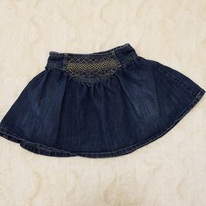 Adorable denim skirt with embroidered front. 4T